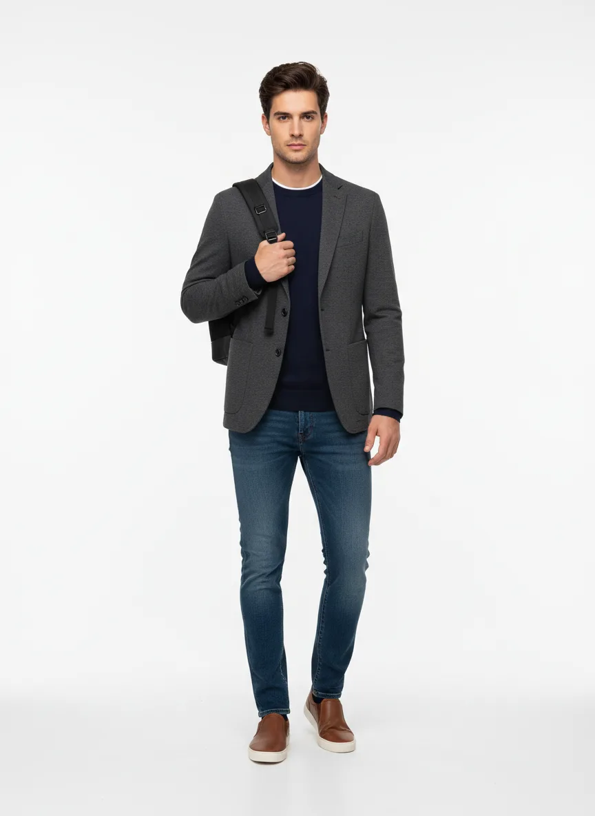 Travelling Outfit Idea: Man’s charcoal travel blazer (compliments brunette hair)