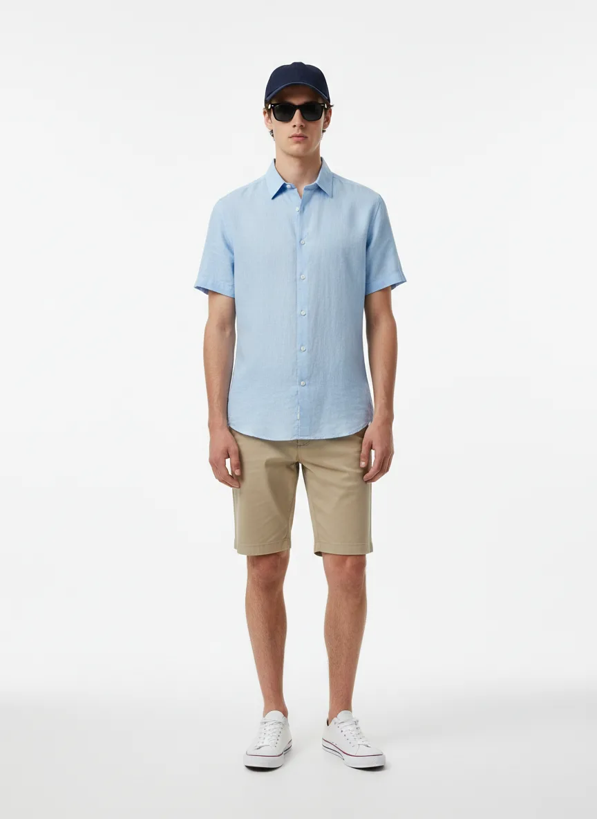 Casual Outfit Idea: Man’s light-blue linen short-sleeve shirt